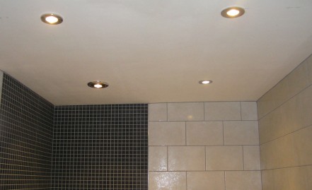 Four low energy spotlights (one including built in extractor fan) fitted